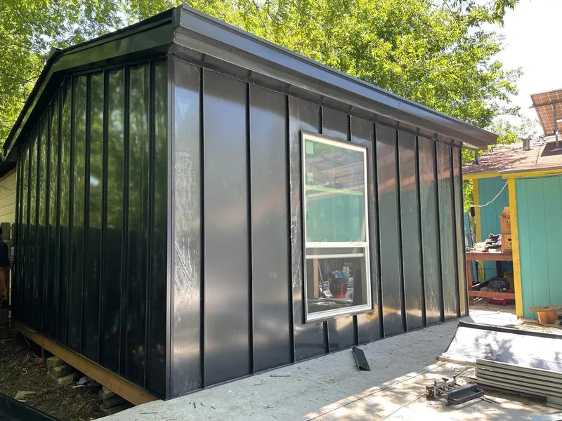 Black standing seam metal wall panels for Metal Roof Installation in Reserve